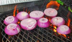 Sliced onions on the grill